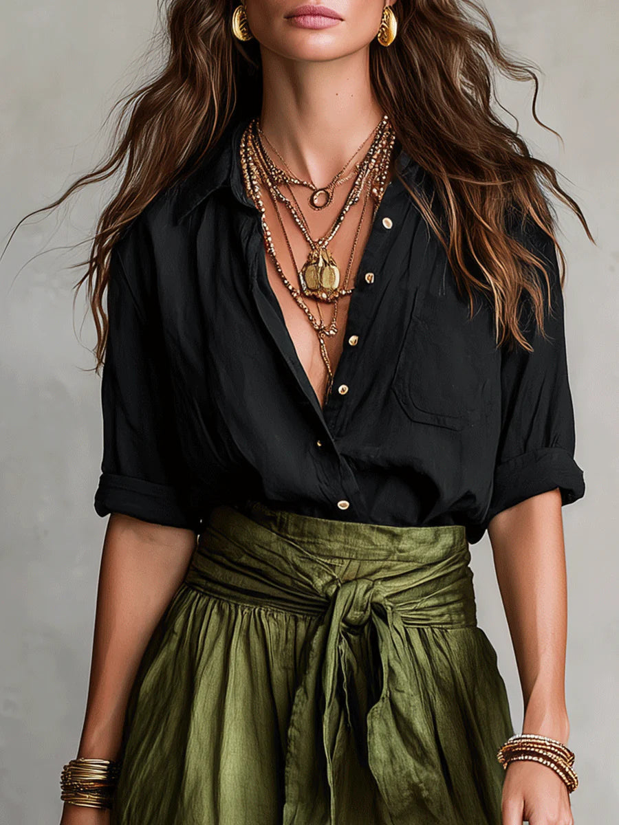 Vera | Conjunto de dos piezas: parte superior negra y falda midi verde oliva