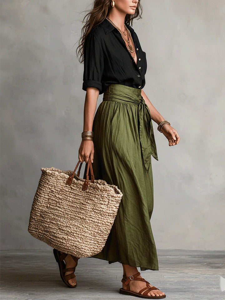 Vera | Conjunto de dos piezas: parte superior negra y falda midi verde oliva